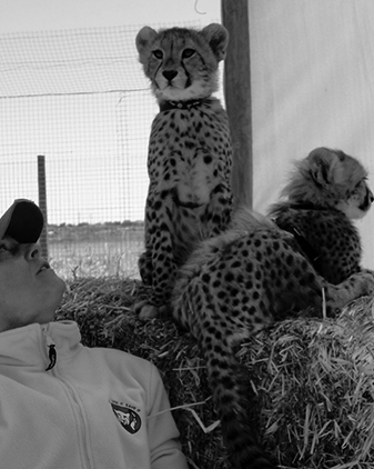Dr Katrina Gregory and cheetah cub